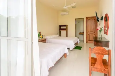 Cama o camas de una habitación en Hotel las flores