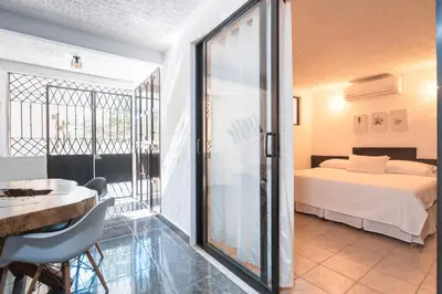 Cama o camas de una habitación en Stunning Duplex near the beach
