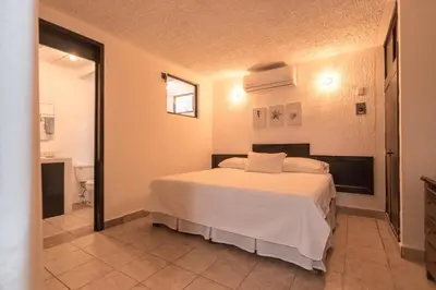 Cama o camas de una habitación en Stunning Duplex near the beach
