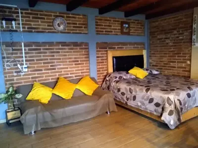 Cama o camas de una habitación en CABAÑA Adán y Eva en Zacatlán