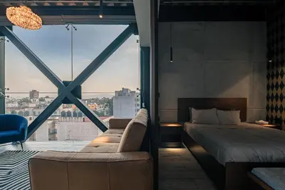Cama o camas de una habitación en The Diamond Loft Modern Luxury with a Fully Equipped Kitchen