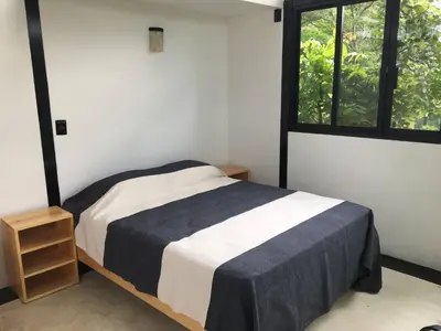 Cama o camas de una habitación en Double Bungalow With Partial Sea View, Full Kitchen