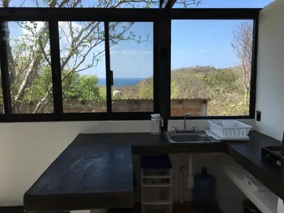 Una cocina o zona de cocina en Double Bungalow With Partial Sea View, Full Kitchen