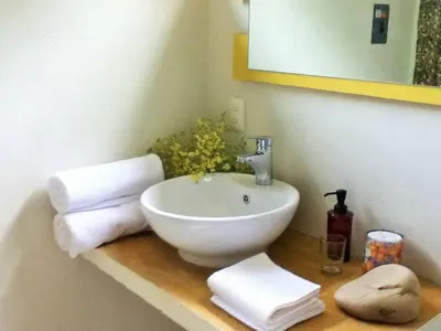 Un baño de Double Bed, Queen size, small kitchen, terrace, wi fi air condition quiet