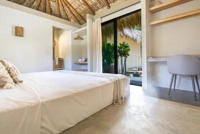 Cama o camas de una habitación en Raíz Hotel Boutique