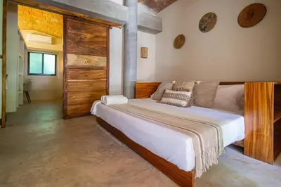 Cama o camas de una habitación en Raíz Hotel Boutique