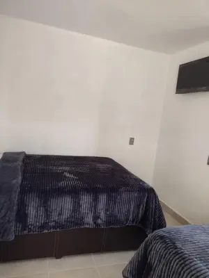 Cama o camas de una habitación en Hotel OCLAS