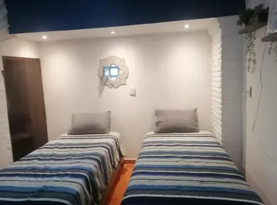 Cama o camas de una habitación en LU'UM Master Suites