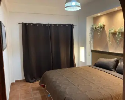 Cama o camas de una habitación en LU'UM Master Suites