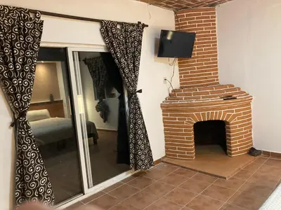 Una televisión o centro de entretenimiento en LU'UM Master Suites