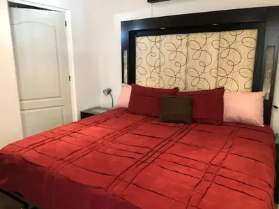 Cama o camas de una habitación en Hermoso Pent House en Armando's Le Club Se Renta