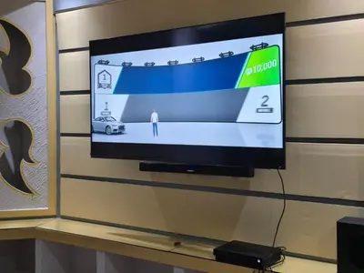 Una televisión o centro de entretenimiento en Precioso departamento en Acapulco Diamante