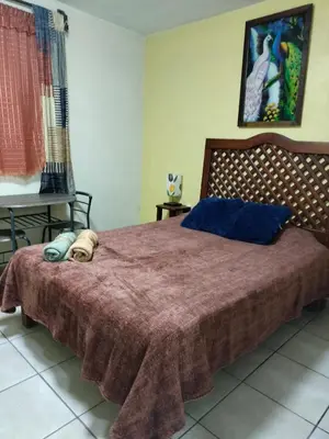 Cama o camas de una habitación en HOSPEDAJE 4Casa San Francisco