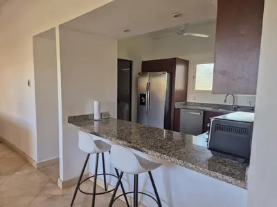 Una cocina o zona de cocina en Departamento con Club Playa Acapulco Diamante 4Rec