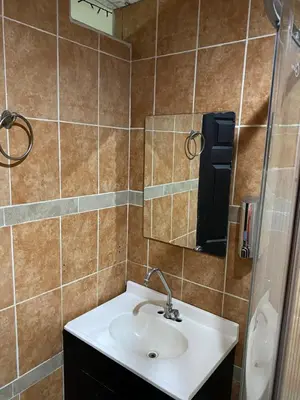 Un baño de Bonito Departamento Verde con terraza