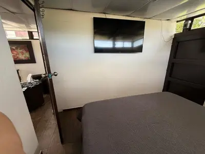 Cama o camas de una habitación en Suite La Lomita #1 Climatizada Zona Dorada Tuxtla