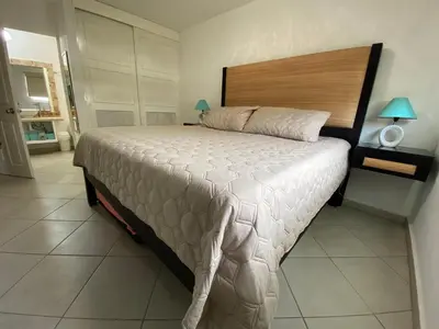 Cama o camas de una habitación en Acapulco Diamante hermoso departamento