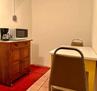 Una televisión o centro de entretenimiento en Loft del Centro