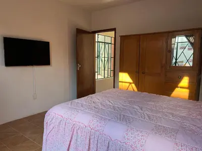 Una televisión o centro de entretenimiento en Loft del Centro