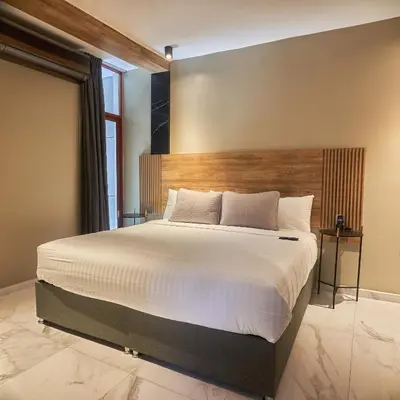 Cama o camas de una habitación en Hotel Garcia Peral