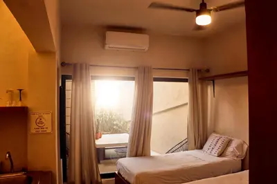 Cama o camas de una habitación en Casa Nomada Tuxtla Hotel - Hostal