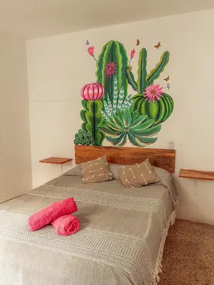 Cama o camas de una habitación en Hostel Casa Maguey