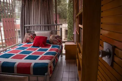 Cama o camas de una habitación en Casa en centro de Coyoacán
