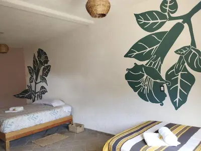 Cama o camas de una habitación en Calli Sofi Posada