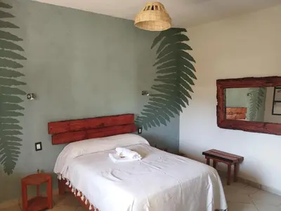 Cama o camas de una habitación en Calli Sofi Posada