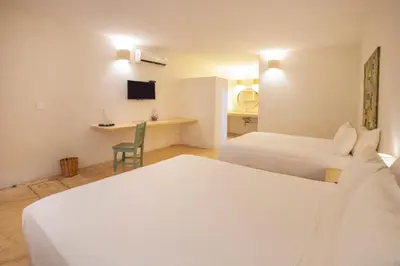 Cama o camas de una habitación en HOTEL BIULÚ