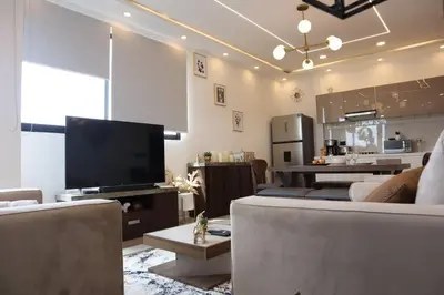 Una televisión o centro de entretenimiento en Luxurious and Central Apartment 2Br