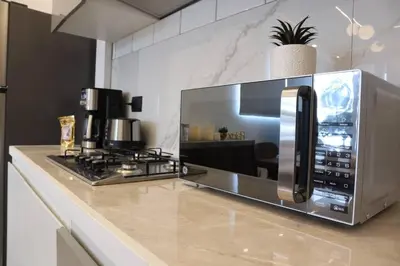 Una cocina o zona de cocina en Luxurious and Central Apartment 2Br