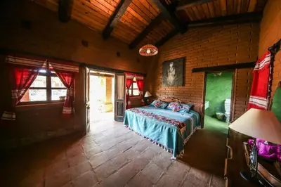 Cama o camas de una habitación en Huayápam Yù'ú Lodge