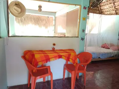 Cama o camas de una habitación en Bungalow confortable en lagunas de Chacahua