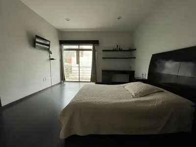 Cama o camas de una habitación en Habitación Ojo de Agua