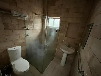 Un baño de Habitación Ojo de Agua