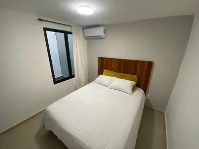 Cama o camas de una habitación en Departamento Maderas