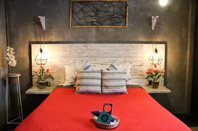 Cama o camas de una habitación en Casa Flora Handmade Hotel