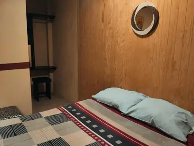 Cama o camas de una habitación en Hotel Nikko