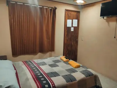 Cama o camas de una habitación en Hotel Nikko