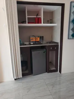 Una cocina o zona de cocina en Hotel Torres Gemelas vista al mar a pie de playa