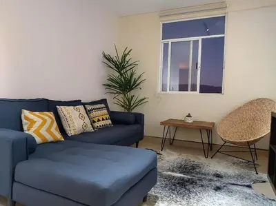 Zona de estar de Moderno y Tradicional, elegante departamento en Oaxaca