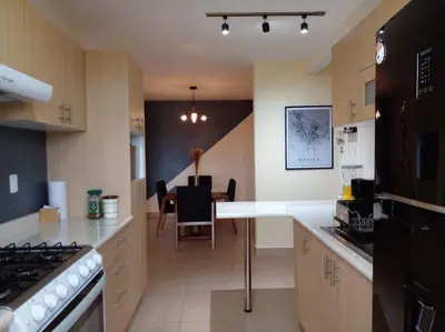 Una cocina o zona de cocina en Moderno y Tradicional, elegante departamento en Oaxaca