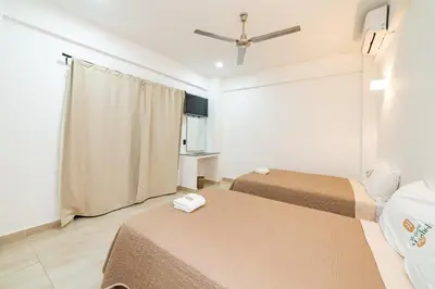 Cama o camas de una habitación en Mi Querida Maribel Hotel