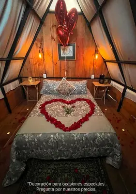 Cama o camas de una habitación en Cabañas Yei Calli