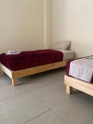 Cama o camas de una habitación en Nomada Hostel Oaxaca - Vive nómada!