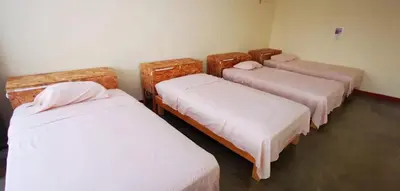 Cama o camas de una habitación en Nomada Hostel Oaxaca - Vive nómada!