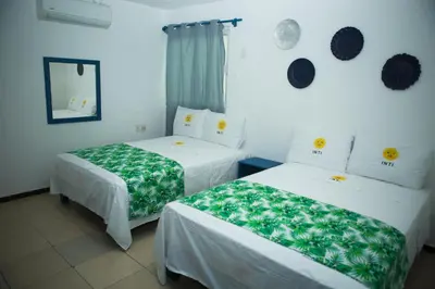 Cama o camas de una habitación en HOTEL INTI