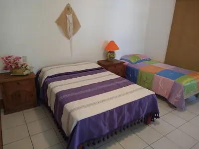 Cama o camas de una habitación en Lush Garden House near beaches with private pool.