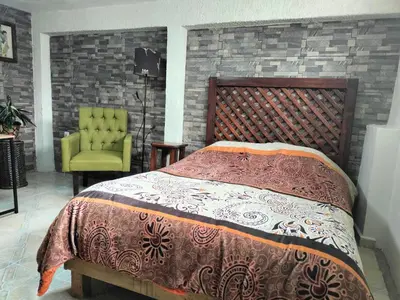 Cama o camas de una habitación en Hospedaje1Casa sn Francisco 2personas